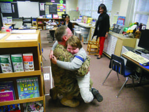 Wade's dad surprise visited her brother at school when he came back from Afghanistan. It was the first time they had seen each other in nine months. 