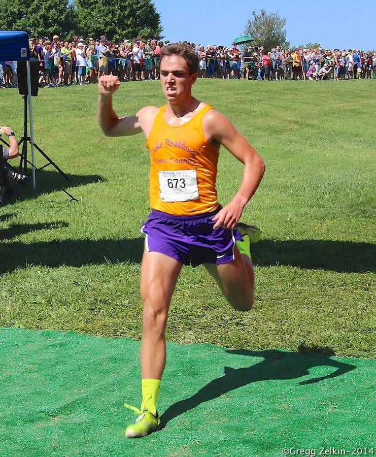 Junior Ben Fogg crosses the finish line in the Monroe Parker Invitational on Sept. 6.