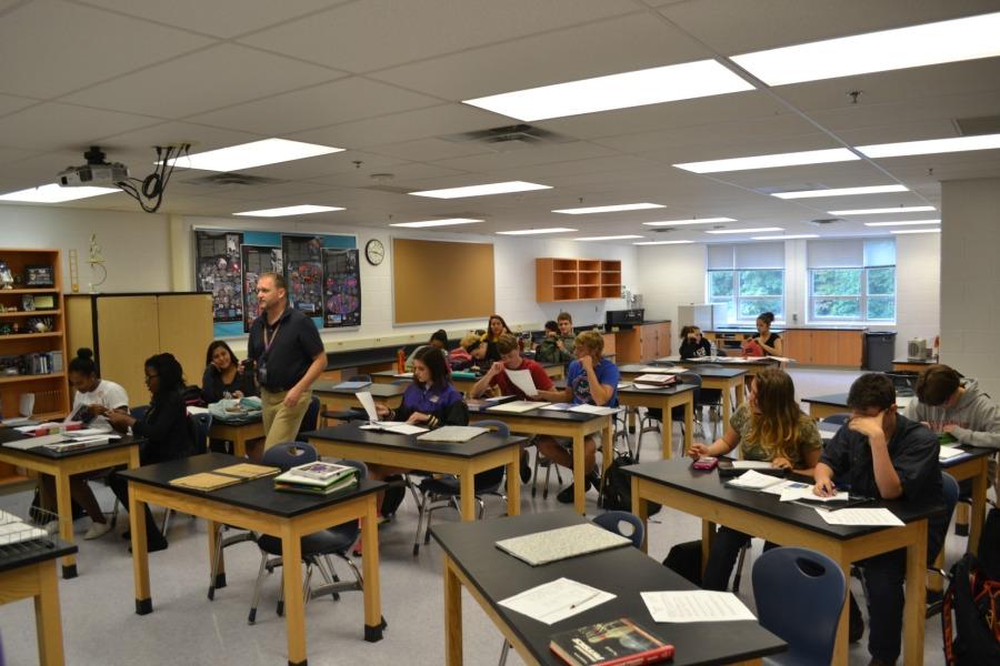 Physics teacher Bill Meyers assists his students during a Wednesday free choice Bruin Block period.