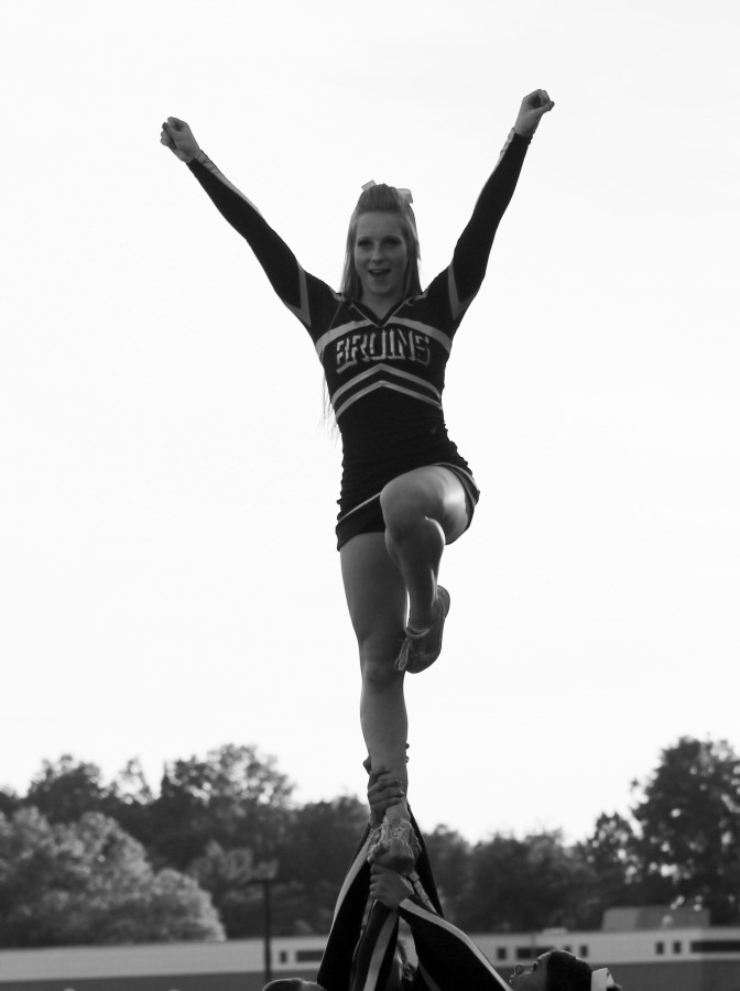 Senior Elisa Stephano cheers before the Robinson vs. LB game on Sept. 12.