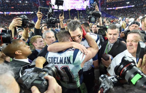 Quarterback Tom Brady celebrates with his teammates after winning Super Bowl XLIV 28-24 against the Seahawks for the fourth time in franchise history. 