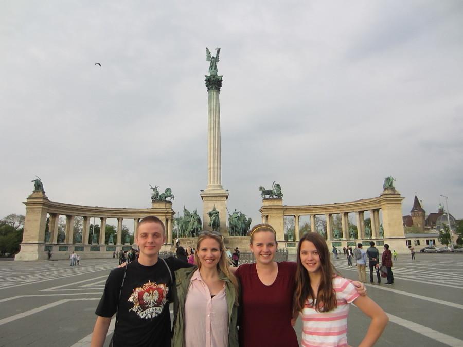 Sophomore David Robb, teacher Morgan Sohl, senior Colleen Murphy and sophomore Victoria Hernandez pose in front of a famous structure during their trip to Costa Rica.