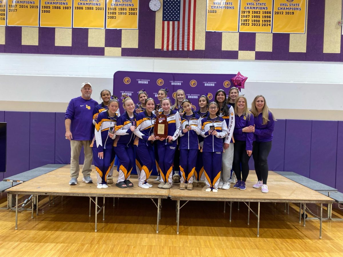 Gymnastics celebrating after winning their fourth consecutive state title on February 28th at the 2024-2025 VHSL state championship. 