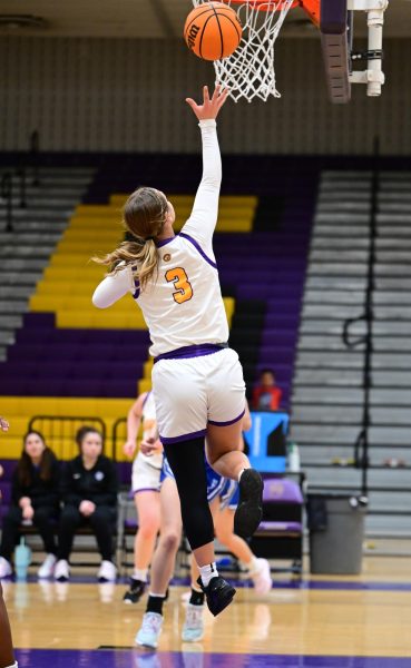 Senior Emily Depaul playing in match vs. Robinson on January 21st 